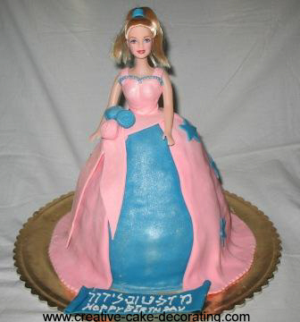 Doll cake with pink and blue dress