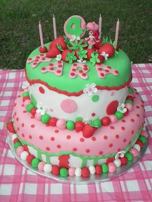 2 tier Strawberry Shortcake themed pink, green and white cake