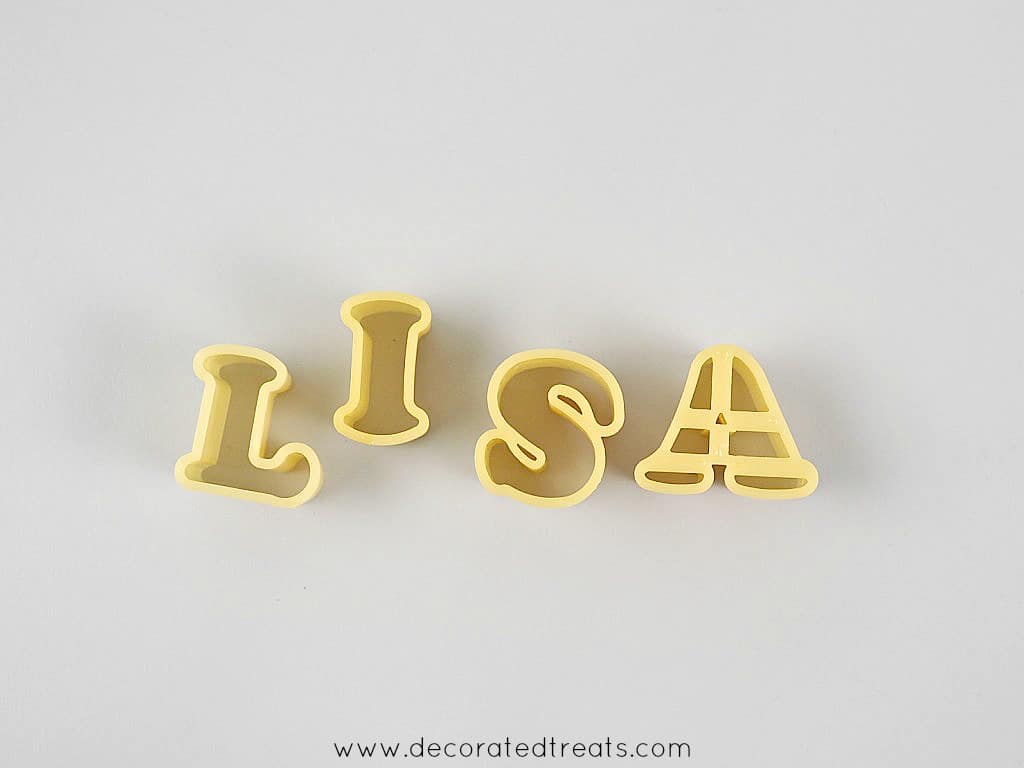 Fondant alphabet cutters in letters L, I, S and A