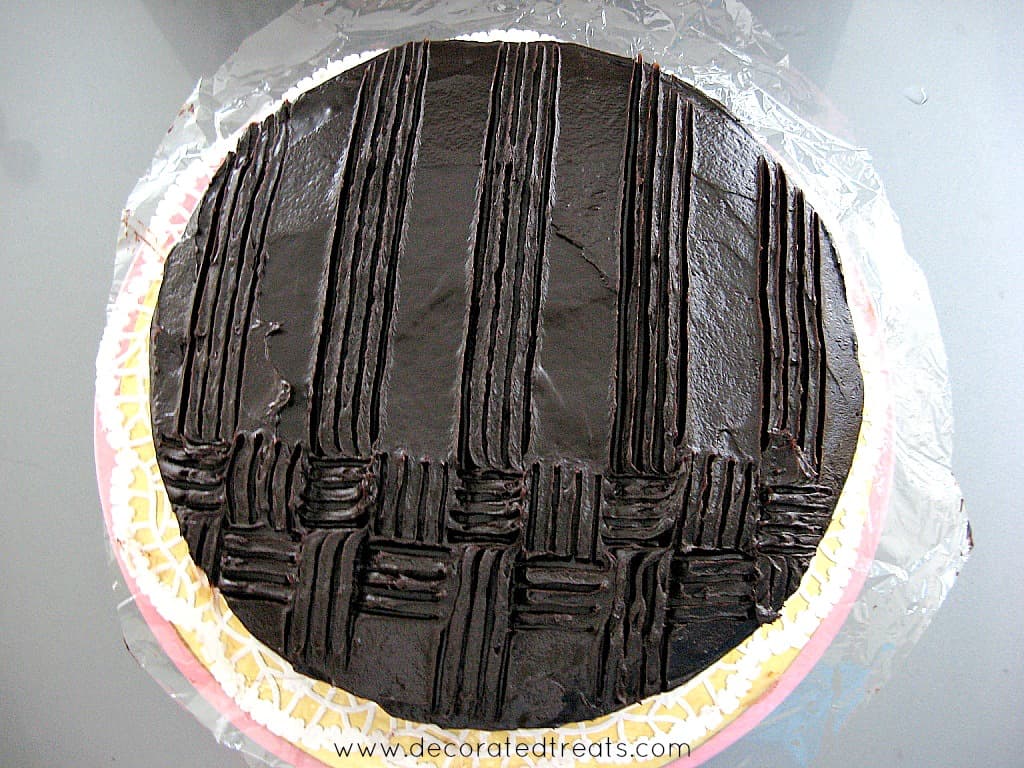 Basket weave pattern on a chocolate covered cake
