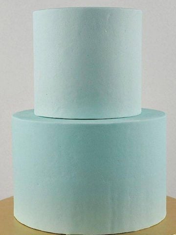 2 tiers of round cake with perfectly smooth sides and sharp edges