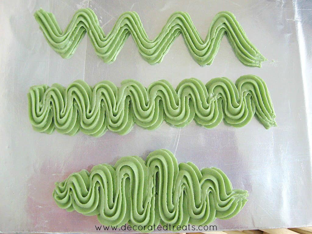 Buttercream zig zag patterns in green