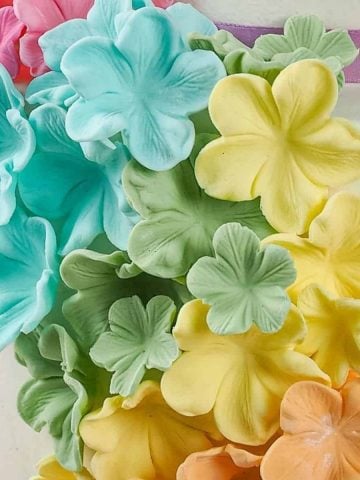 Colorful sugar flowers on a cake