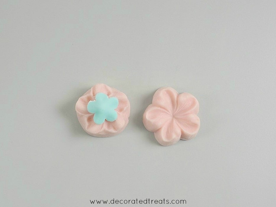 A 5 petal blue fondant flower cut out with sugar blossom silicone molds