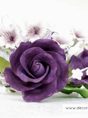 Purple gum paste roses in a bouquet