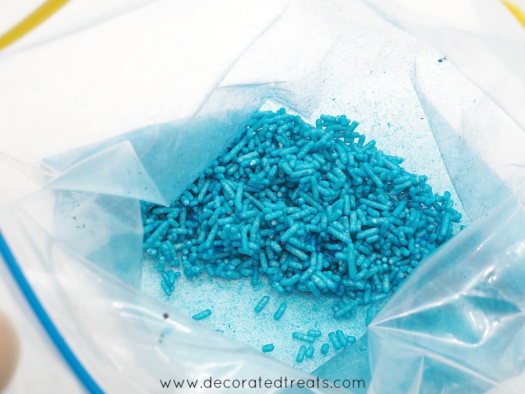 Dark blue sprinkles in a plastic bag