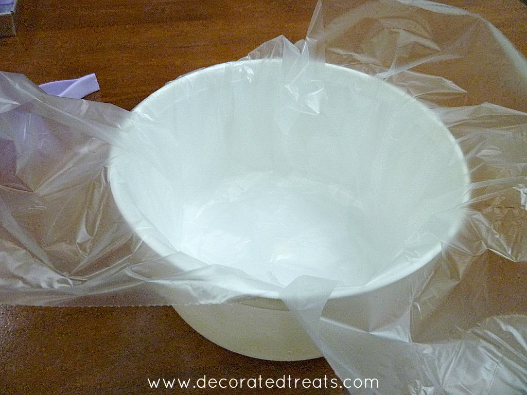 A piece of plastic sheet in a round white container