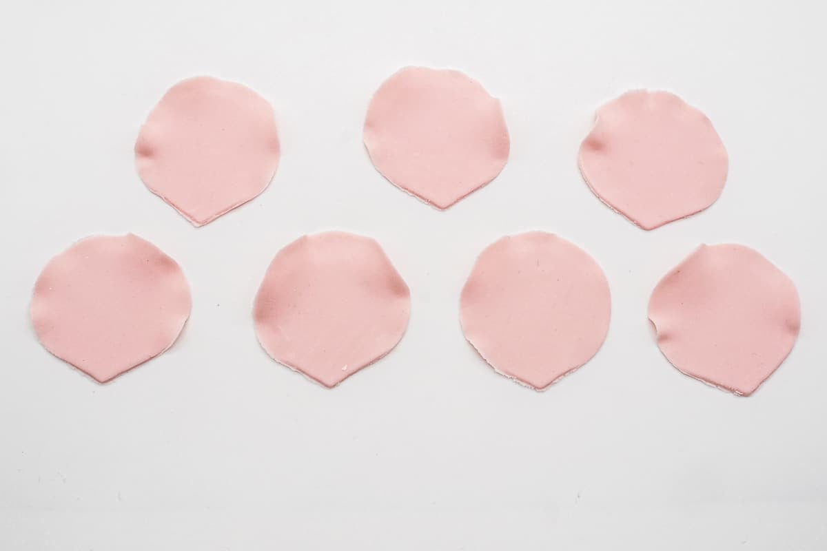 7 pink gum paste tear drop shaped petals