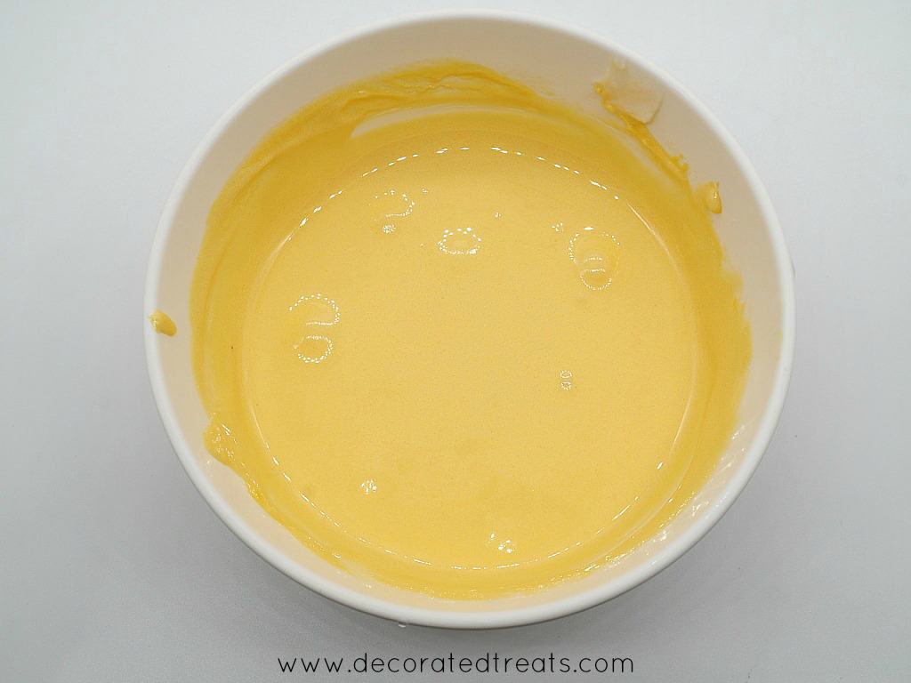 Yellow icing in a bowl