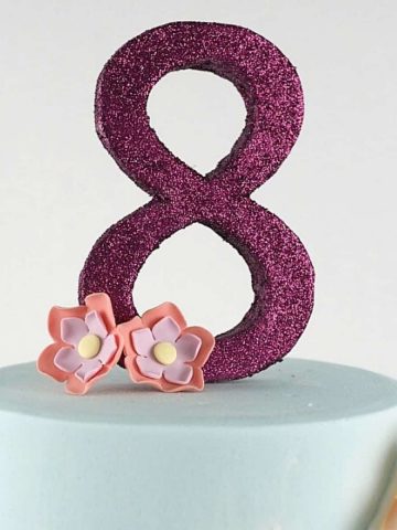 Number 8 cake topper in purple glitter