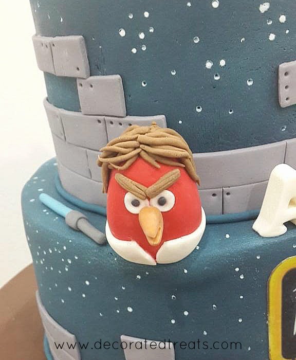 Red Skywalker in fondant on a cake
