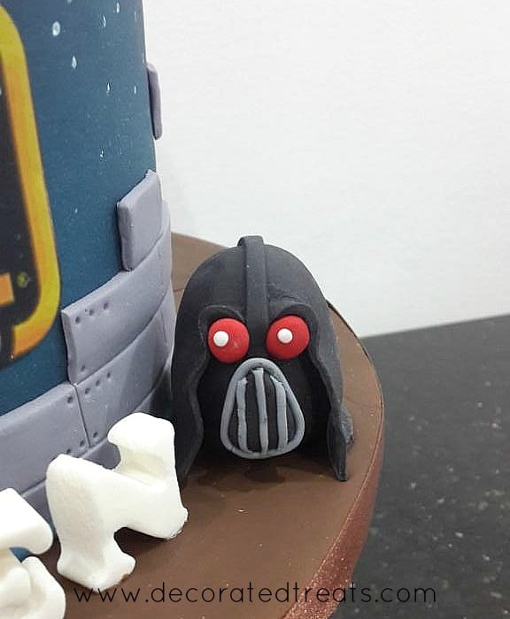 Lard Vader in fondant on a cake board