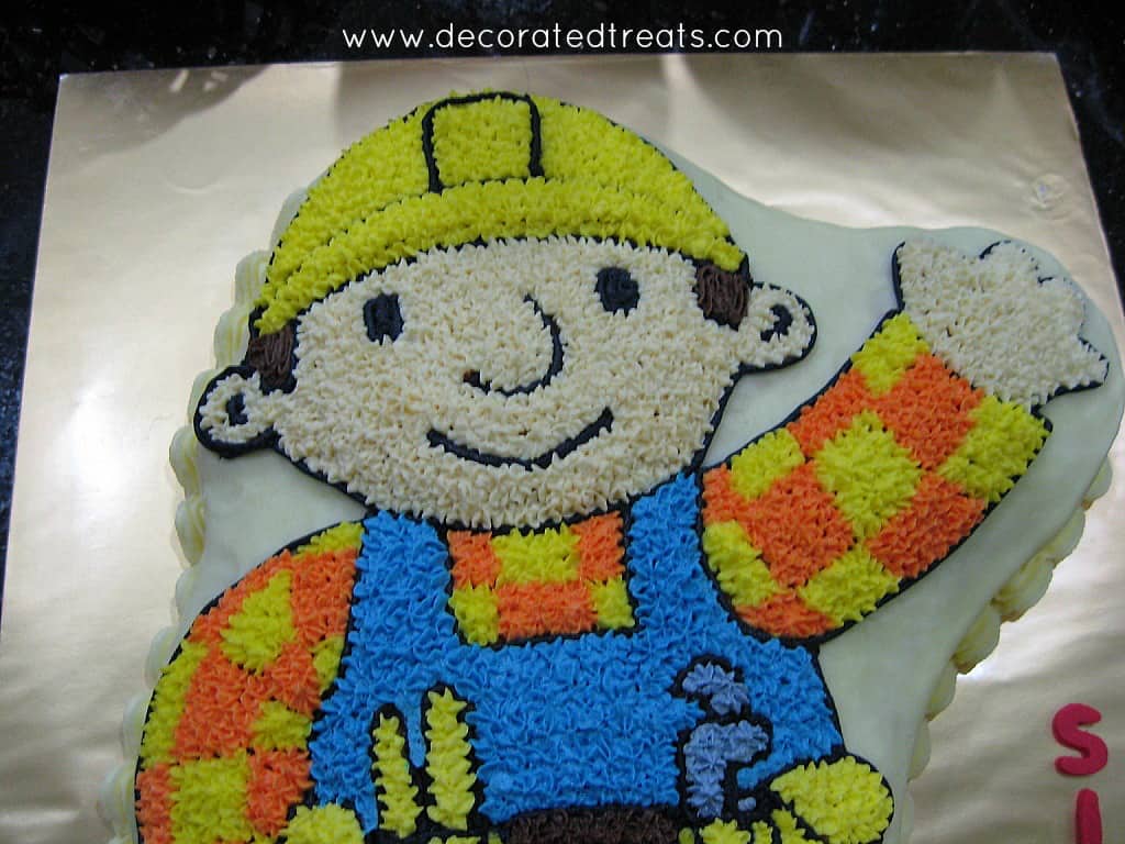 Bob the Builder cake on a gold cake board