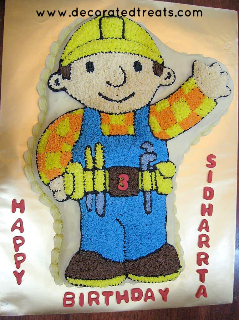Bob the Builder cake on a gold cake board