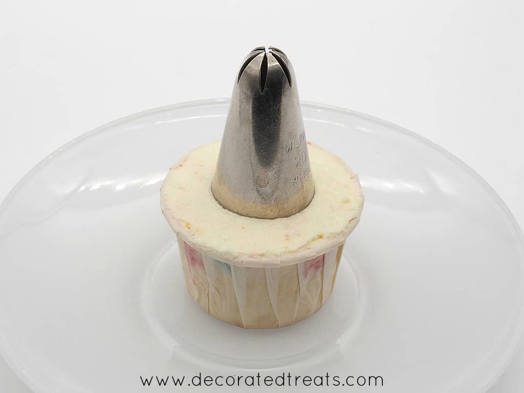 Piping tip on a cupcake.