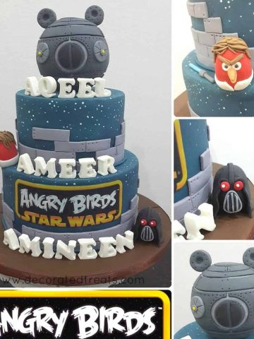 A 3 tier cake with Angry Birds Star War theme. Cake is decorated in grey, with Angry Birds characters in 3D.