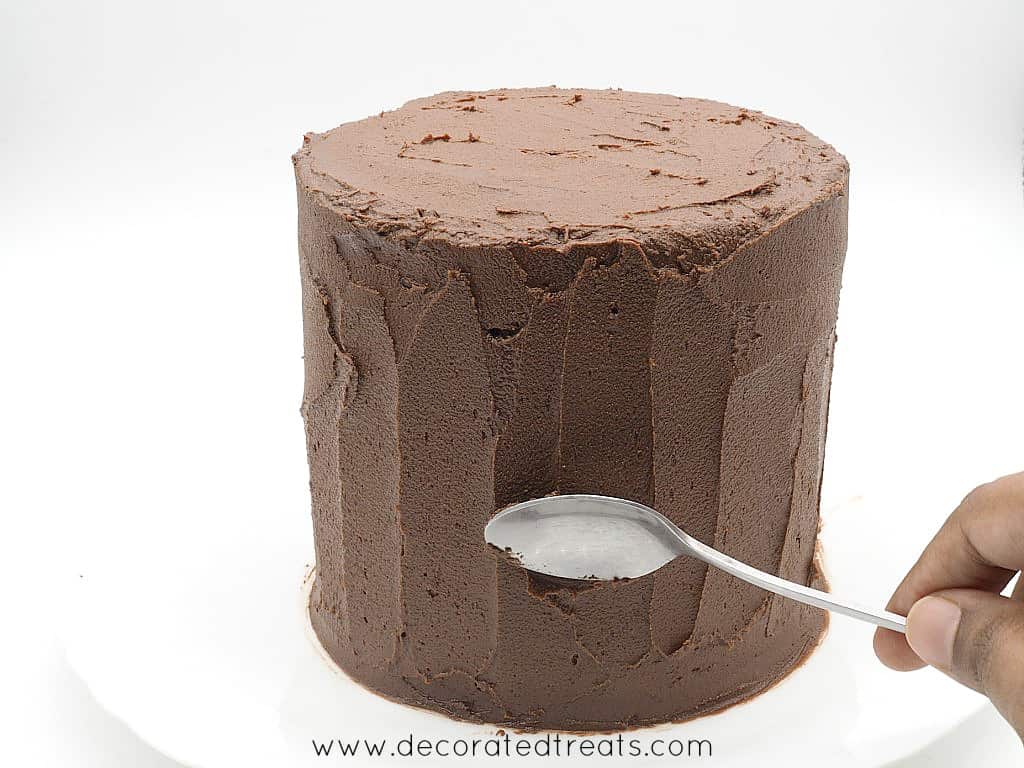 A round cake decorated in chocolate icing