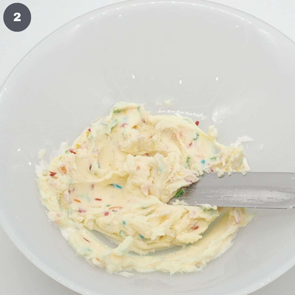 A bowl of sprinkles buttercream.