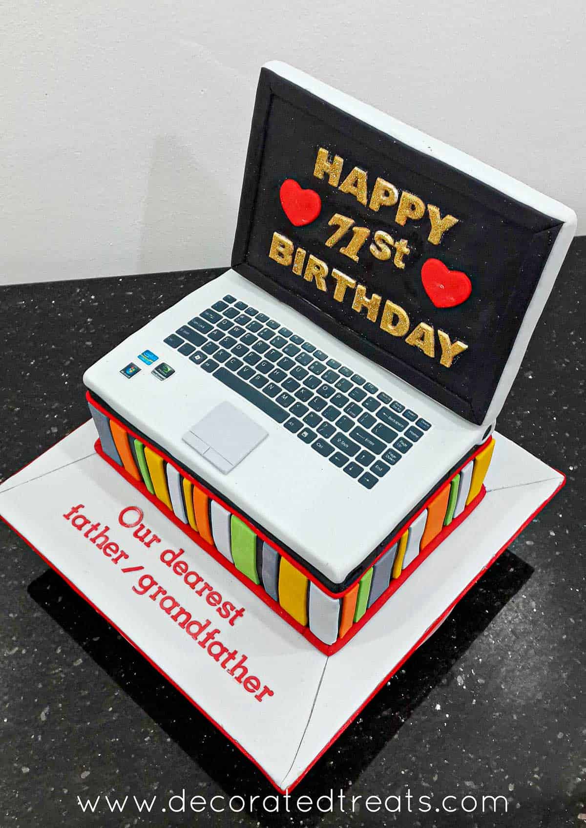 A laptop shaped cake