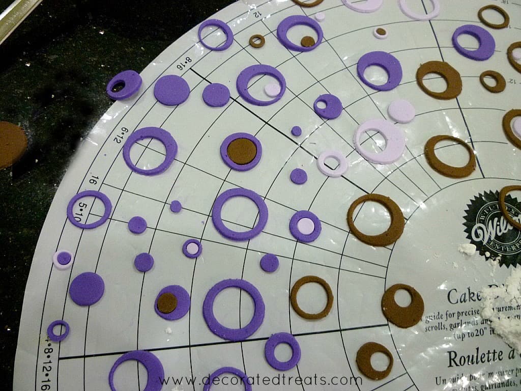 Fondant circle cut out in purple and brown