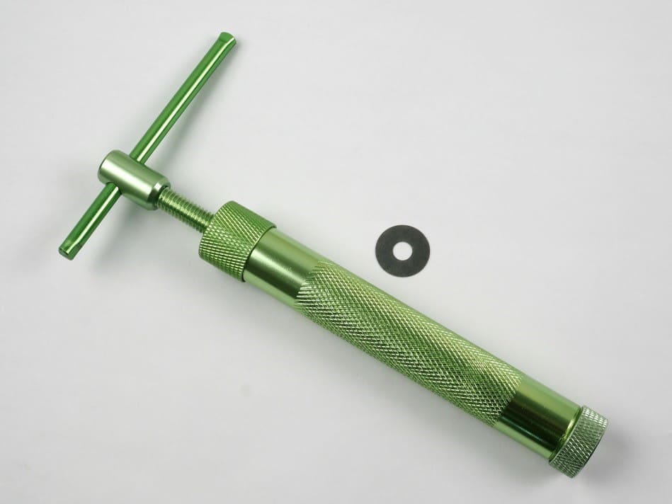 A green fondant extruder tool