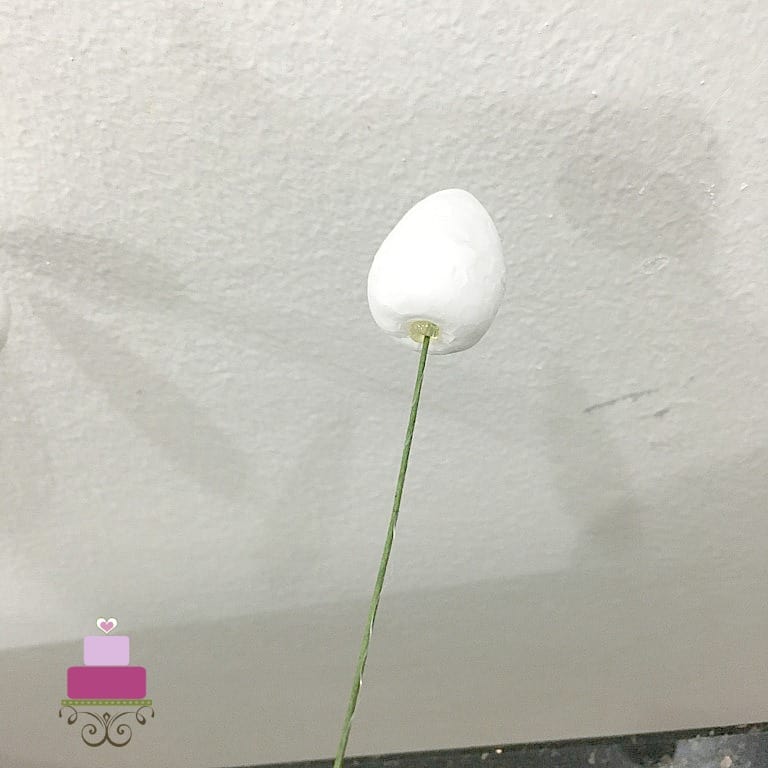 A styrofoam bud with a wire inserted into it.