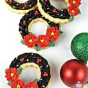 Cookies decorated to look like poinsettia wreaths