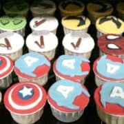 Cupcakes decorated with Caption America logos.