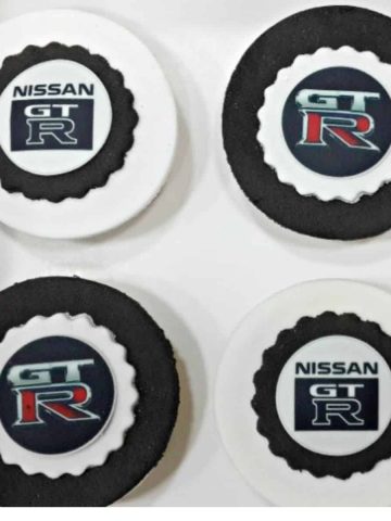 Cupcakes decorated with Nissan GTR edible images.