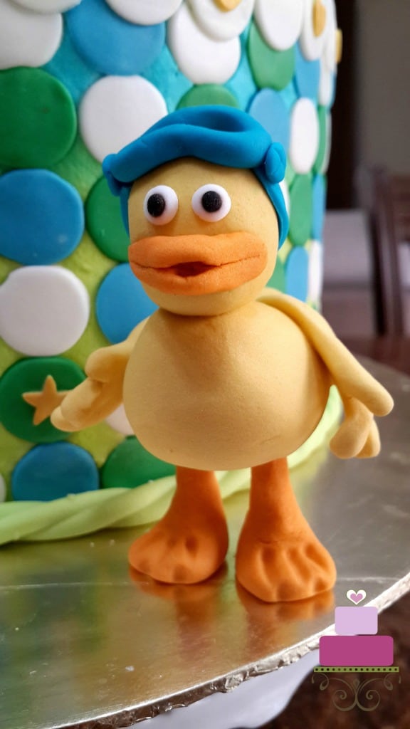 Duck character from Timmy Time show on a cake