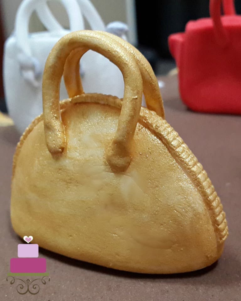 Gold fondant handbag topper