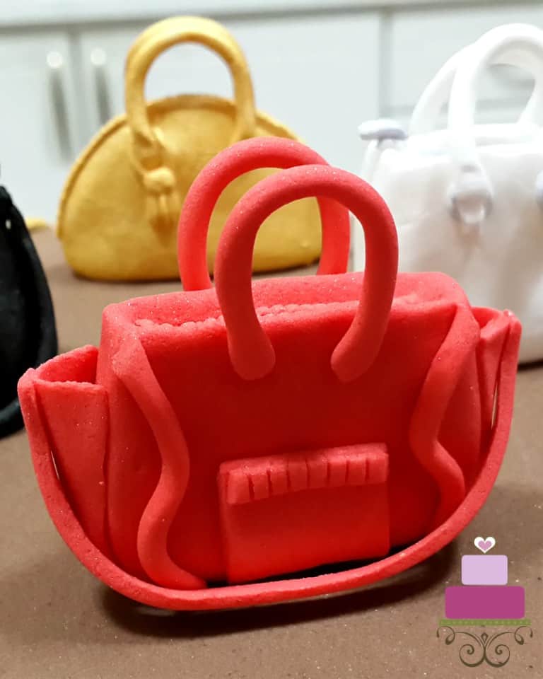 Red fondant handbag topper
