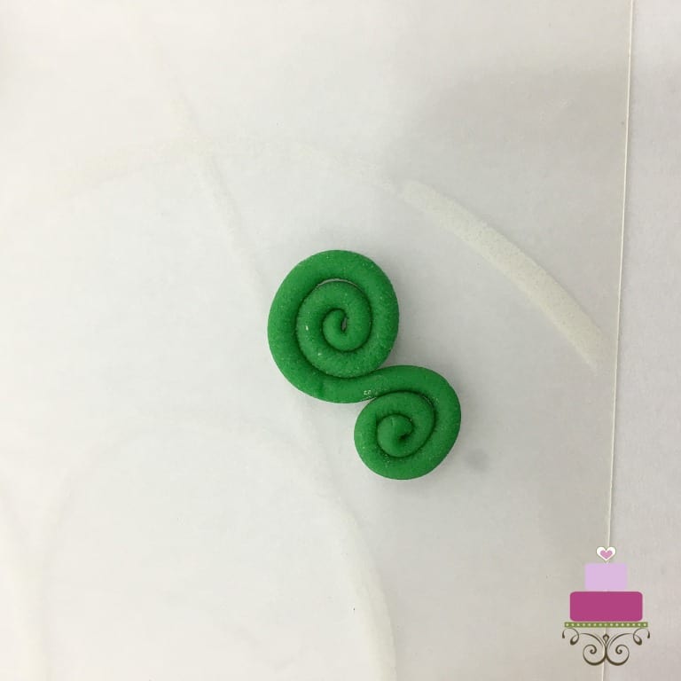 Swirled piece of green fondant