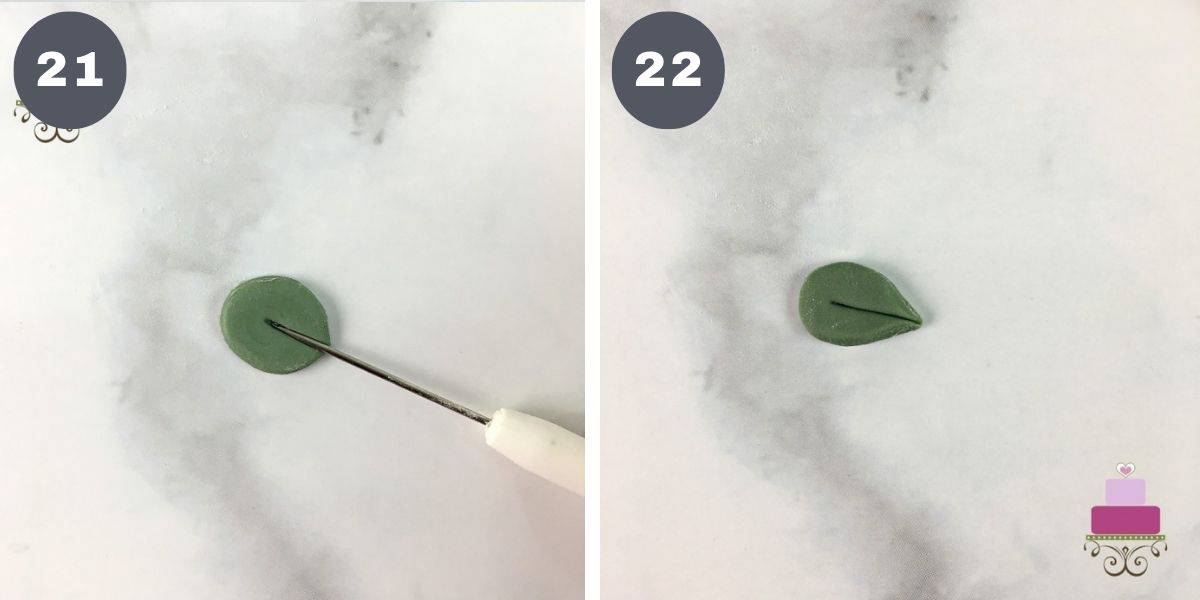 Using a needle tool to make leaves from oval green fondant cut out.