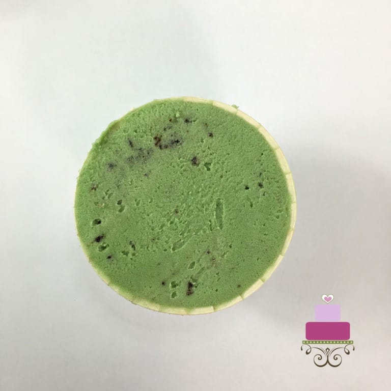 Green icing covered cupcake