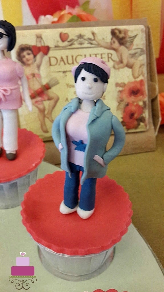 A cupcake with a figurine topper