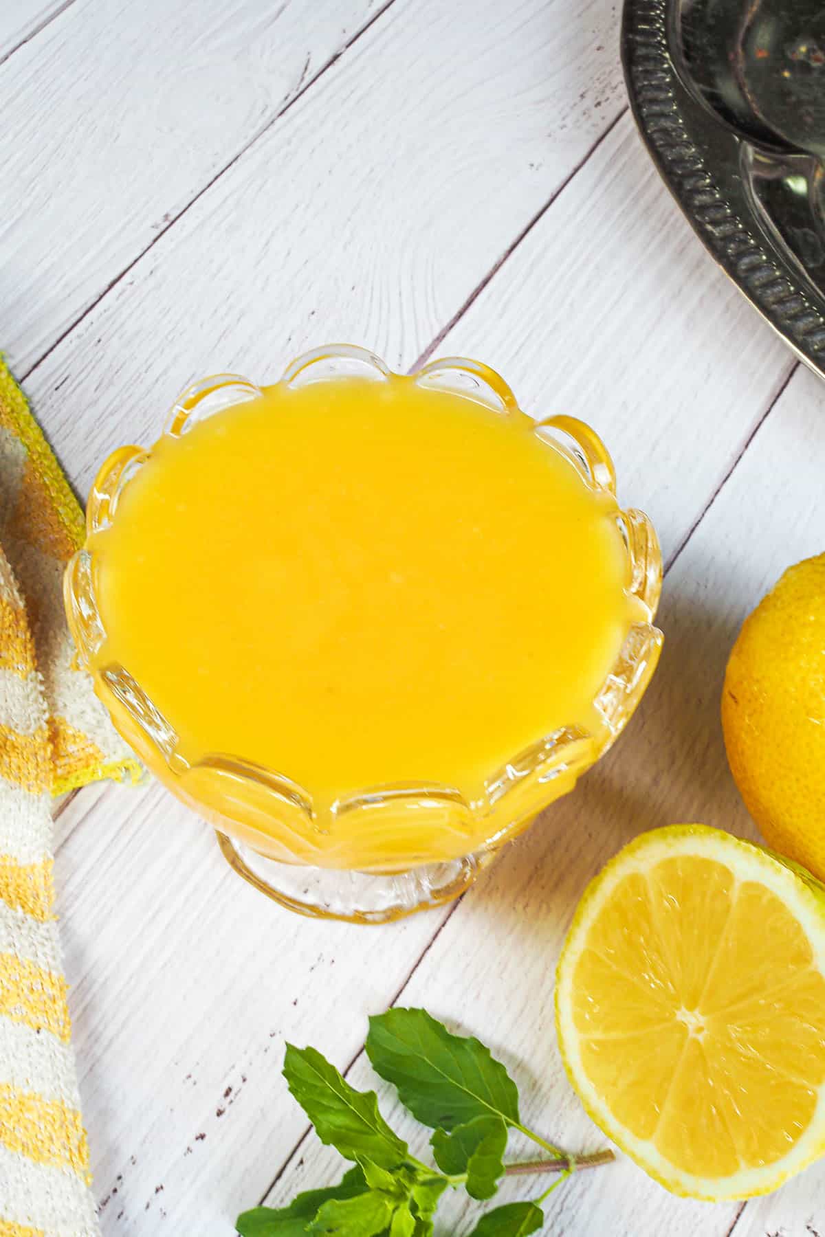 A glass jar of lemon curd