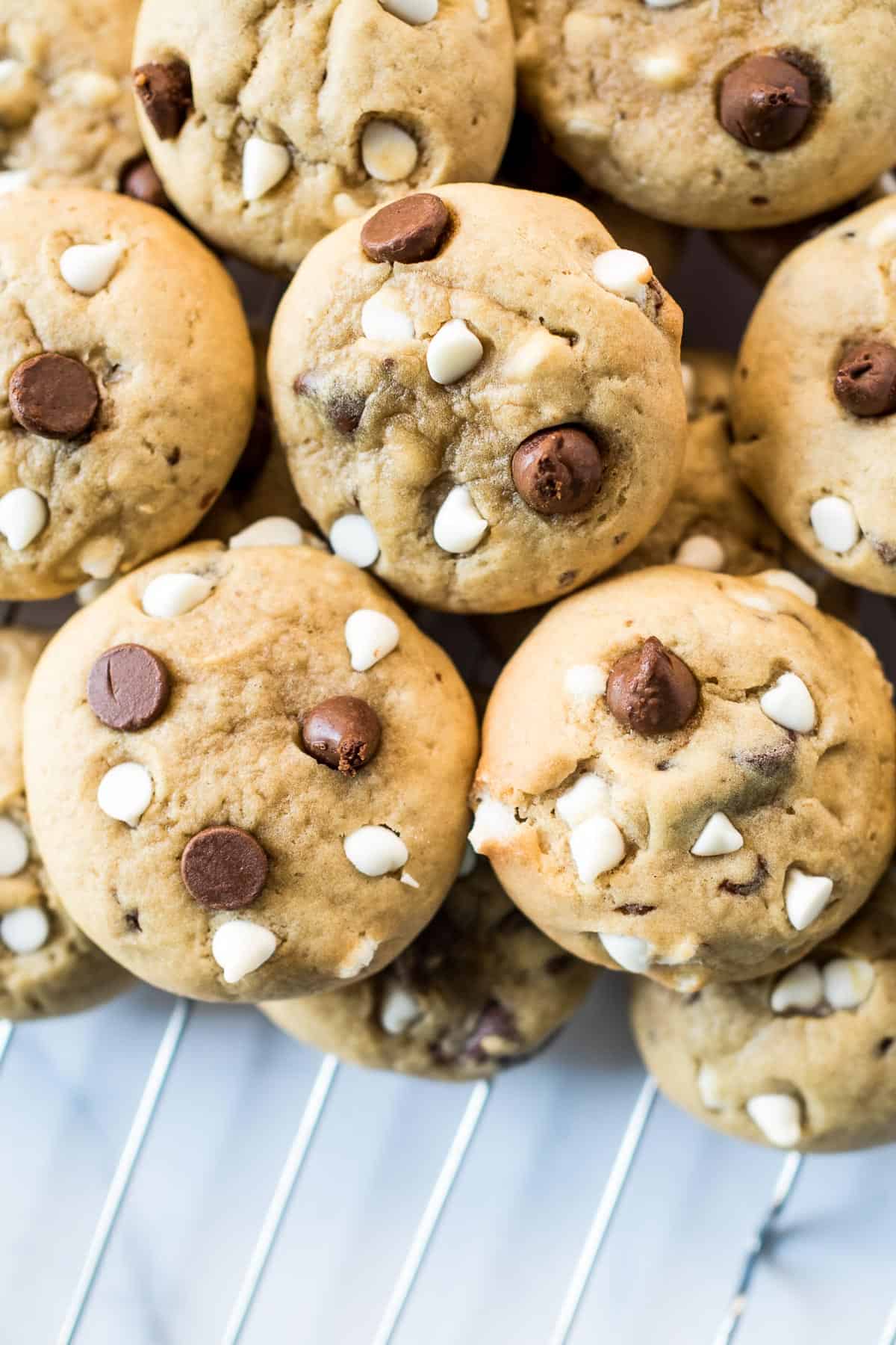 Close up image of cookies with milk and white chocolate chips