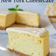 A slice of cheesecake with sour cream topping.