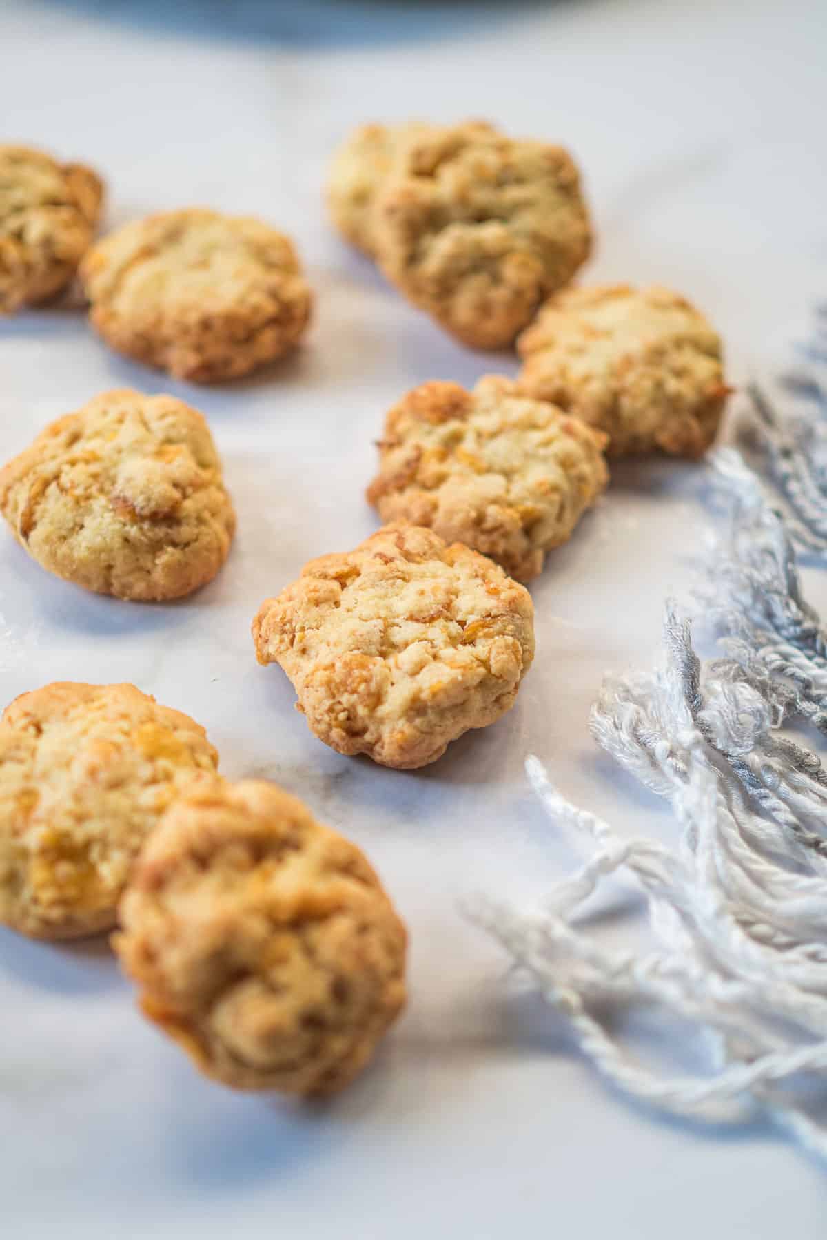 Cornflake cookies against a marble background