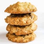 A stack of 4 old fashioned oatmeal raisin cookies.