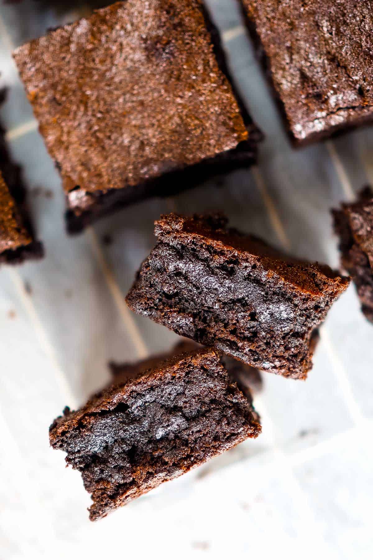 Side view of square blocks of chocolate brownies