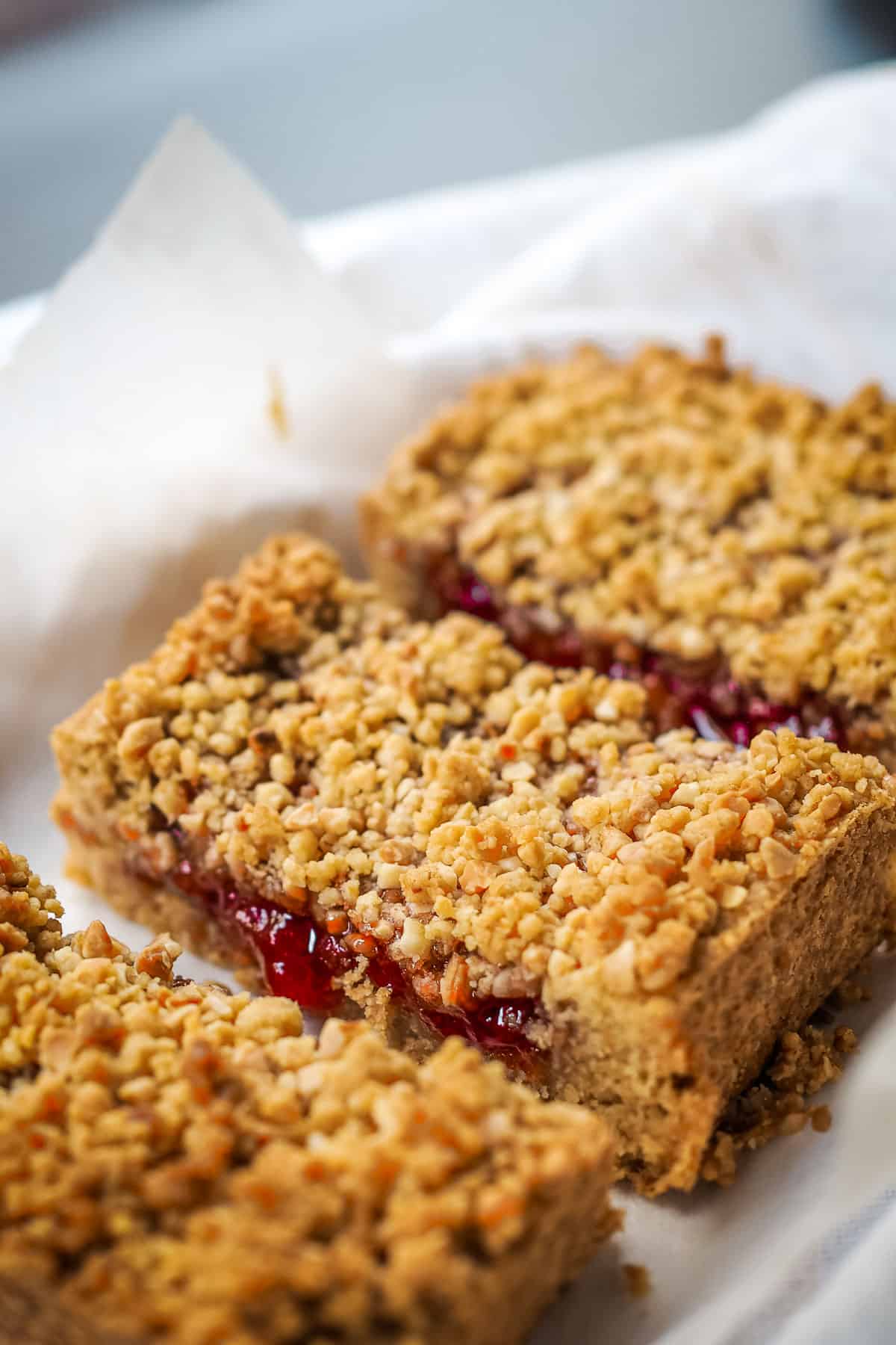 Sliced oat bars with strawberry filling.