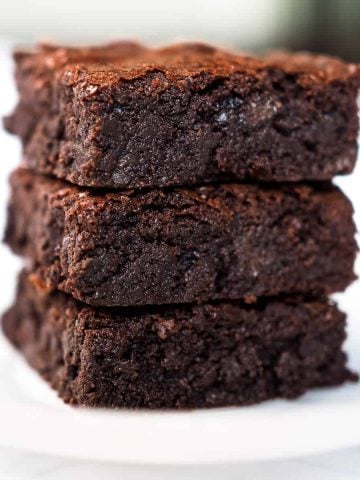 A stack of 3 square pieces of brownie