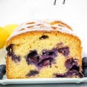 The front view of a blueberry cake loaf that can be sliced.