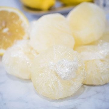 Frozen lemonade concentrate wrapped in cling wrap