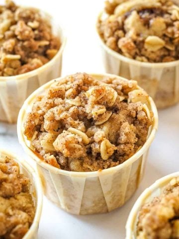Streusel muffins against marble background.