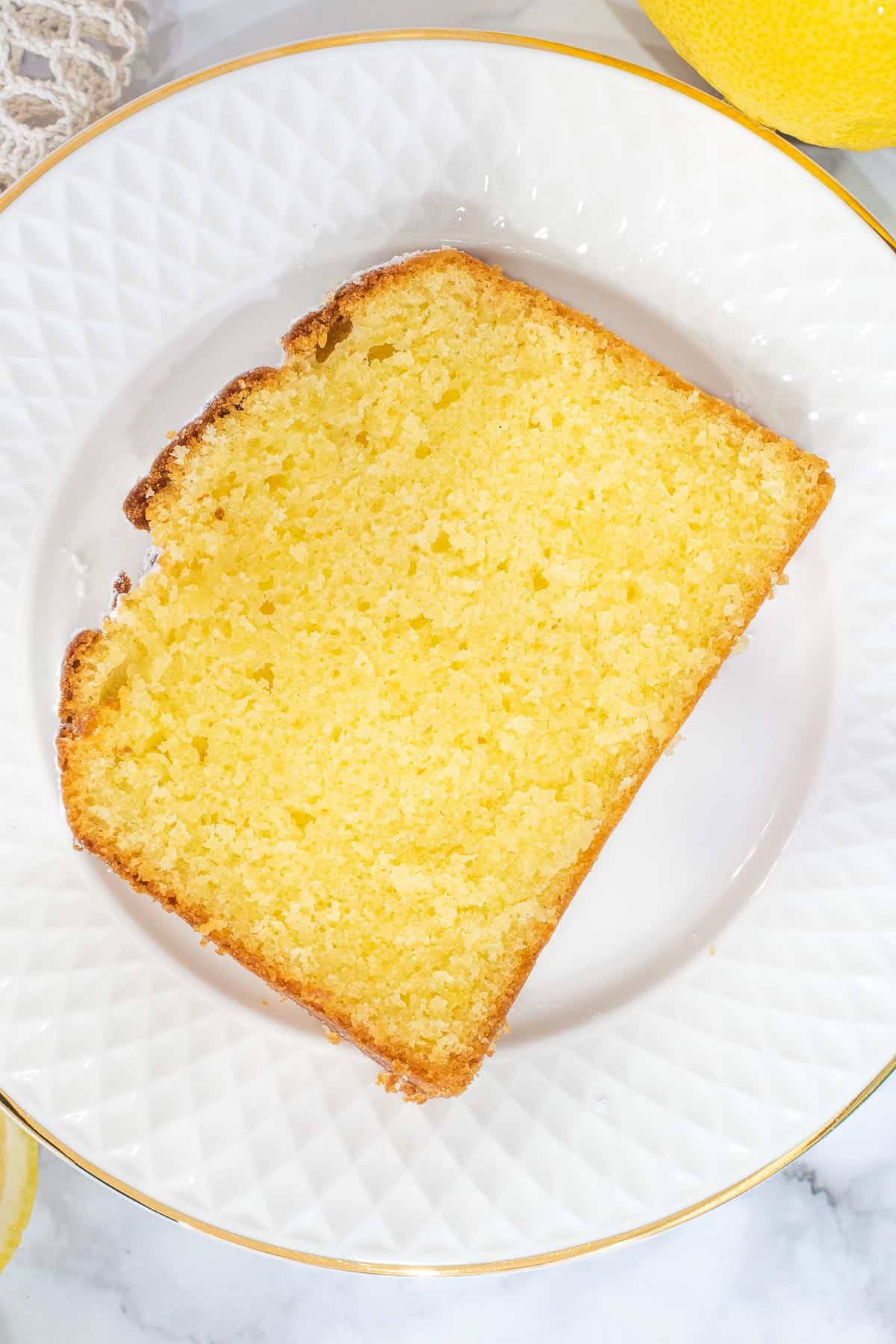 A slice of cake on a white plate