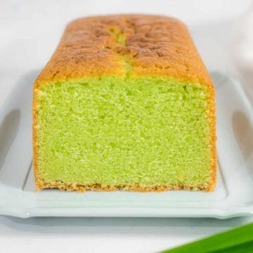 Front view of a cut pandan cake loaf