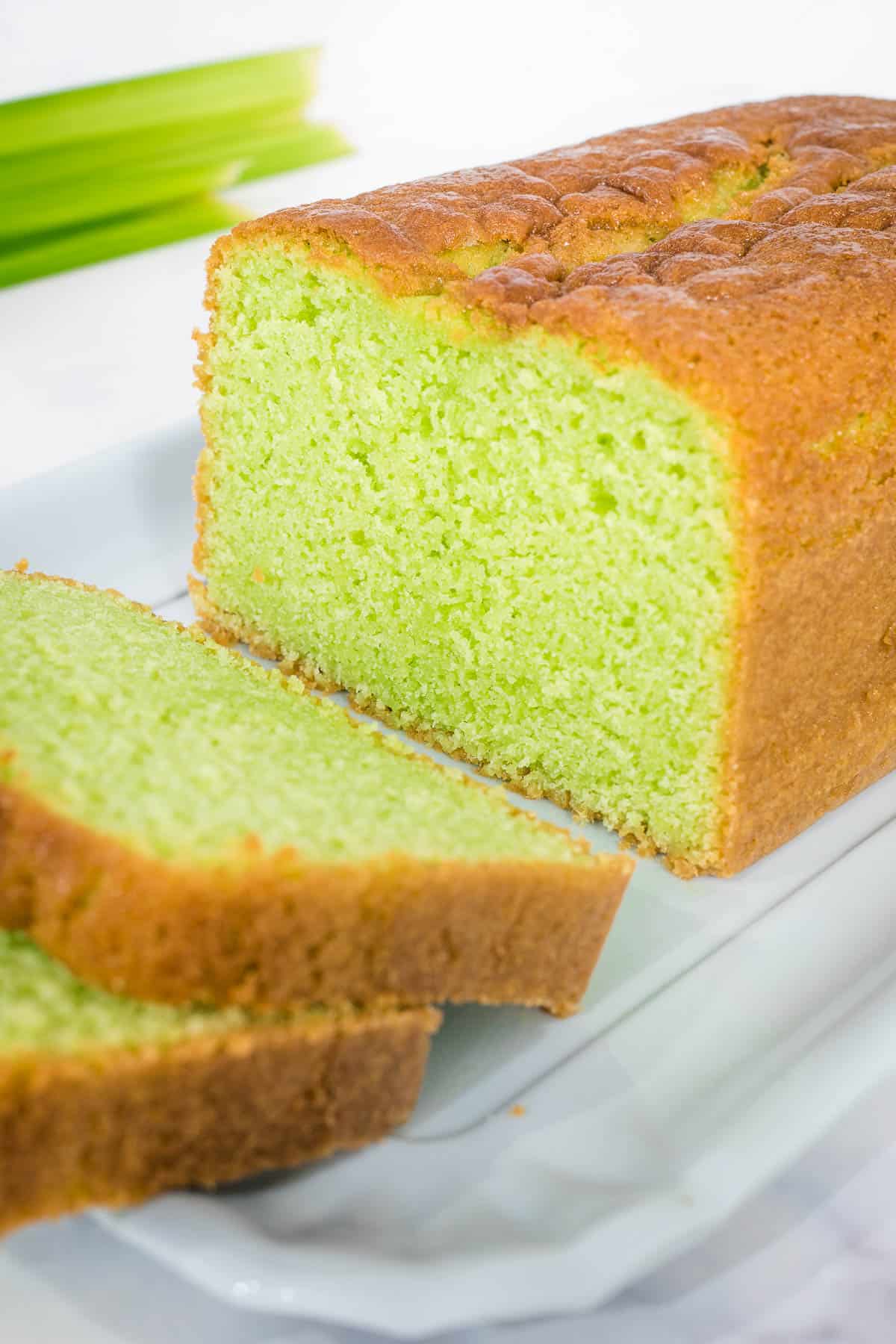 Slices of green loaf cake.